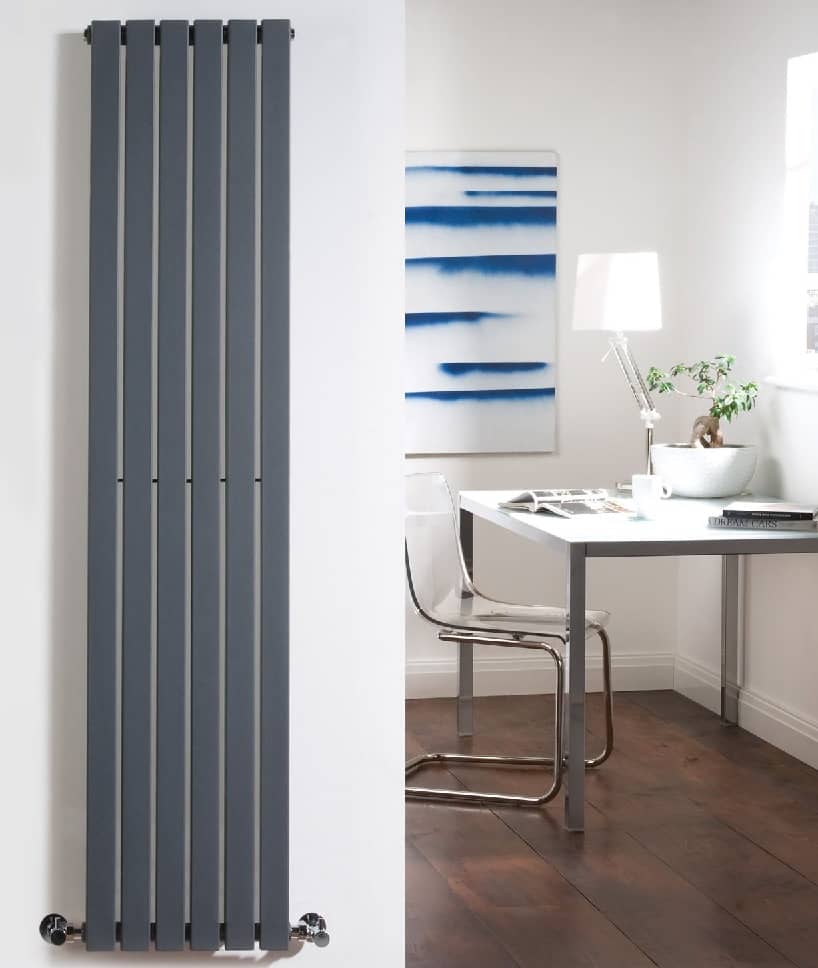 six panel vertical anthracite radiator on white wall
